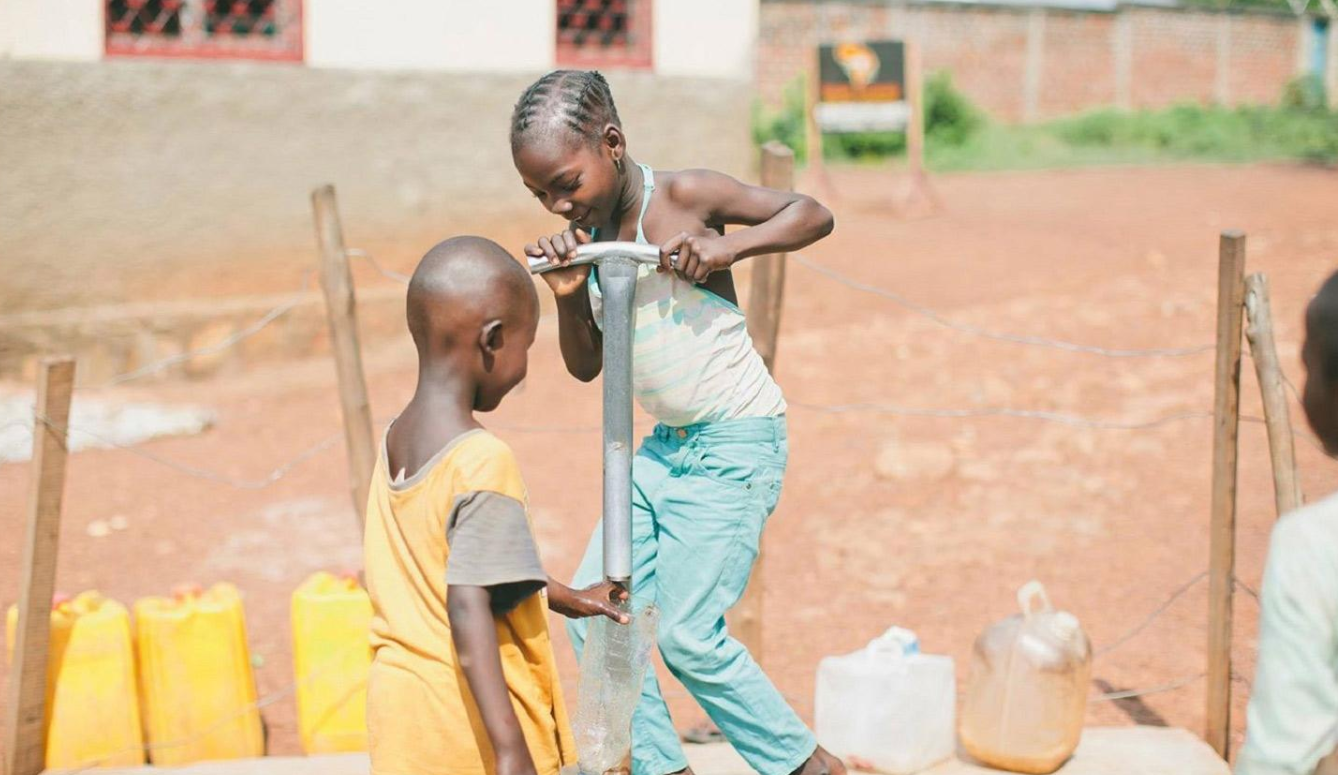 Optimizing well placement to eliminate water poverty